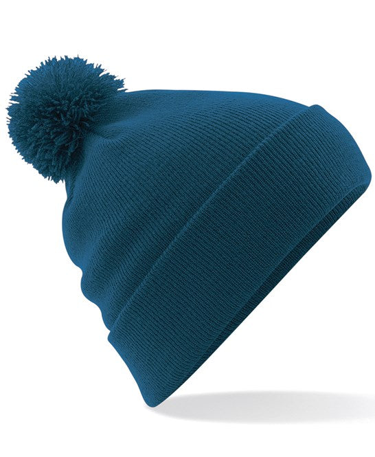 Engineered knit ribbed pom pom beanie